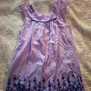 Adorable lavender dress with embroidery on bottom